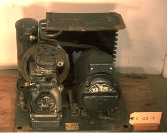 Open system refrigation machine